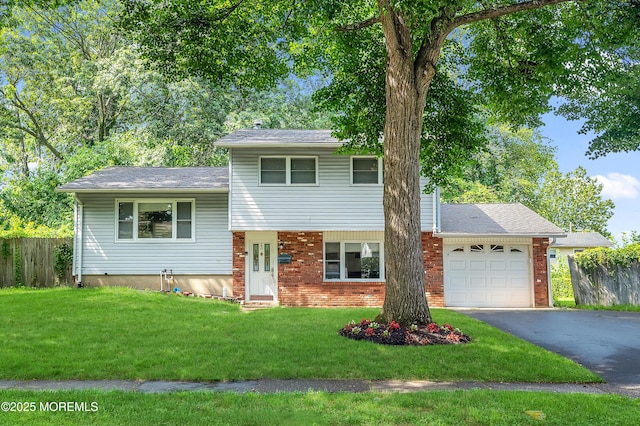 23 Montana Dr, Jackson, NJ 08527 - split level home featuring a garage, asphalt driveway, brick siding, a shingled roof, and entry steps