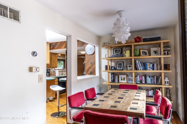 28 Florence Ave, Leonardo, NJ 07737 - dining space with a chandelier and wood finished floors