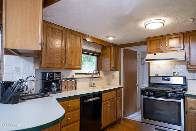 28 Florence Ave, Leonardo, NJ 07737 - kitchen featuring stainless steel gas range, black dishwasher, range hood, a textured ceiling, and decorative backsplash