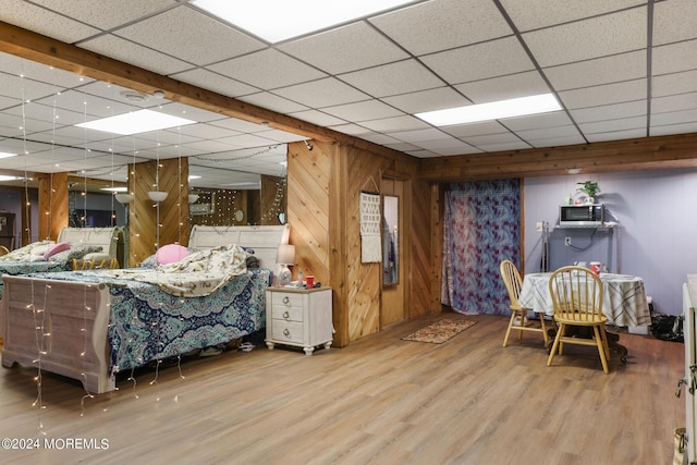 135 E Veterans Hwy, Jackson, NJ 08527 - bedroom with a drop ceiling, wood finished floors, and wood walls