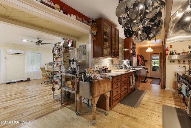 135 E Veterans Hwy, Jackson, NJ 08527 - kitchen featuring a wall mounted AC, backsplash, light wood-style flooring, glass insert cabinets, and ornamental molding