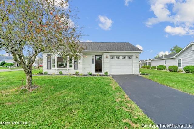 13 Everest Dr N, Brick, NJ 08724 - view of front of home featuring a garage, driveway, a front lawn, a shingled roof, and brick siding
