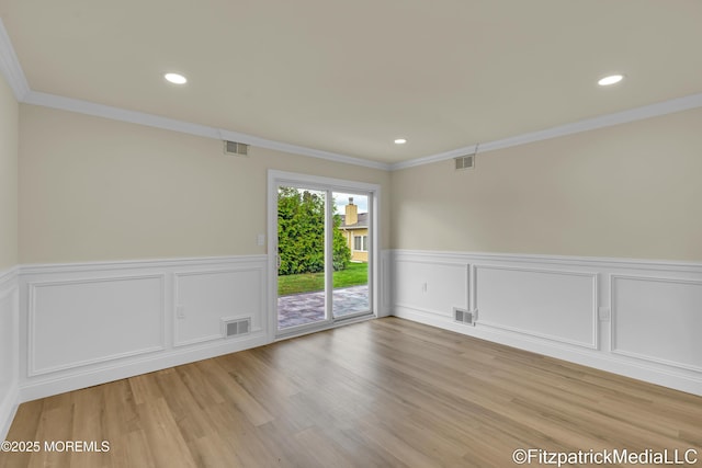 13 Everest Dr N, Brick, NJ 08724 - spare room featuring crown molding, wainscoting, recessed lighting, and light wood-style flooring