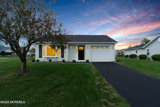 13 Everest Dr N, Brick, NJ 08724 - view of front facade with a garage, brick siding, driveway, a front lawn, and a shingled roof