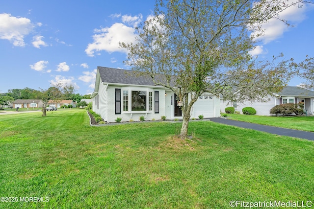13 Everest Dr N, Brick, NJ 08724 - view of front of home with driveway, a garage, a front yard, and roof with shingles