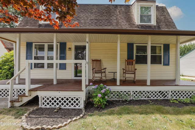 107 Seneca Lake Dr, Little Egg Harbor, NJ 08087 - view of front of house with a porch and roof with shingles