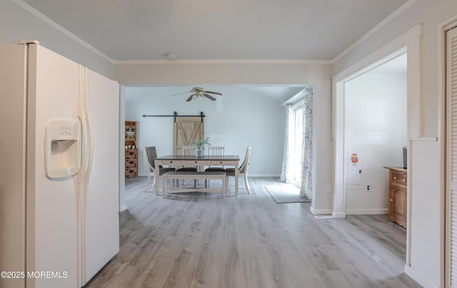 107 Seneca Lake Dr, Little Egg Harbor, NJ 08087 - dining area featuring crown molding, light wood-type flooring, a barn door, and ceiling fan