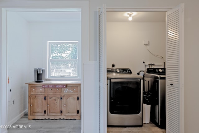107 Seneca Lake Dr, Little Egg Harbor, NJ 08087 - laundry area with washer and dryer and light wood-type flooring