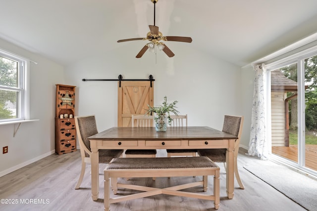 107 Seneca Lake Dr, Little Egg Harbor, NJ 08087 - dining room with a barn door, vaulted ceiling, light wood-type flooring, and ceiling fan