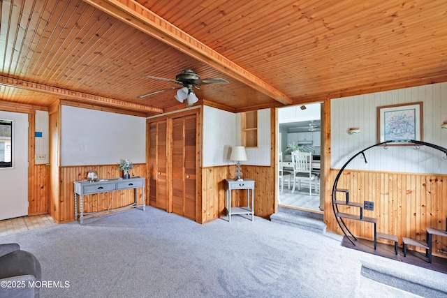 107 Seneca Lake Dr, Little Egg Harbor, NJ 08087 - living area featuring wood walls, a ceiling fan, carpet floors, and wood ceiling
