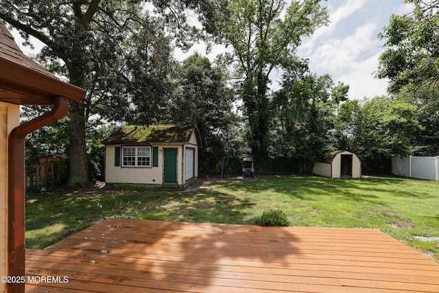 107 Seneca Lake Dr, Little Egg Harbor, NJ 08087 - wooden deck featuring a fenced backyard and a storage unit