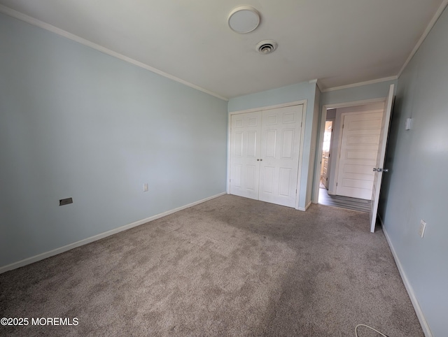 44J Cambridge Ct Unit 2010, Lakewood, NJ 08701 - unfurnished bedroom with carpet flooring, a closet, and ornamental molding
