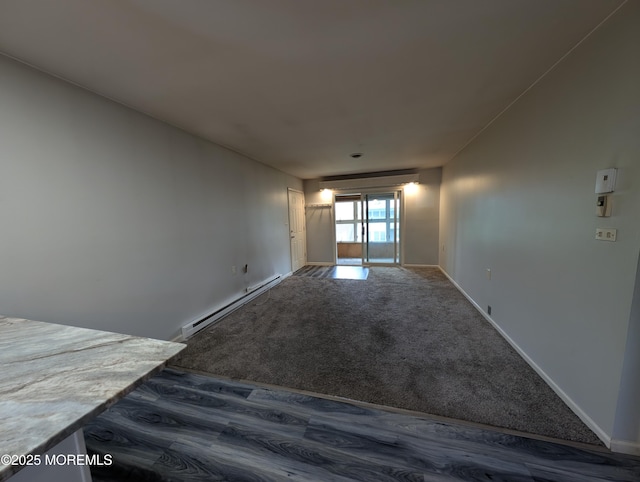 44J Cambridge Ct Unit 2010, Lakewood, NJ 08701 - spare room featuring a baseboard radiator and baseboards