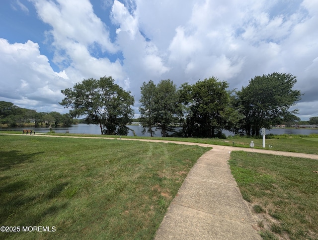 44J Cambridge Ct Unit 2010, Lakewood, NJ 08701 - view of community featuring a water view and a lawn