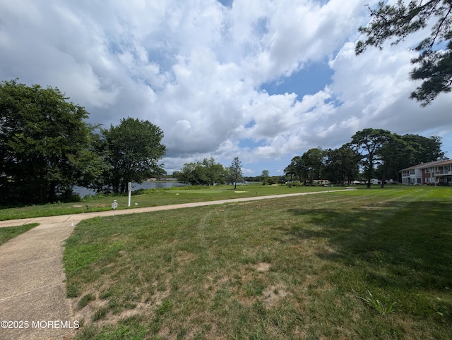 44J Cambridge Ct Unit 2010, Lakewood, NJ 08701 - view of community with a water view and a yard