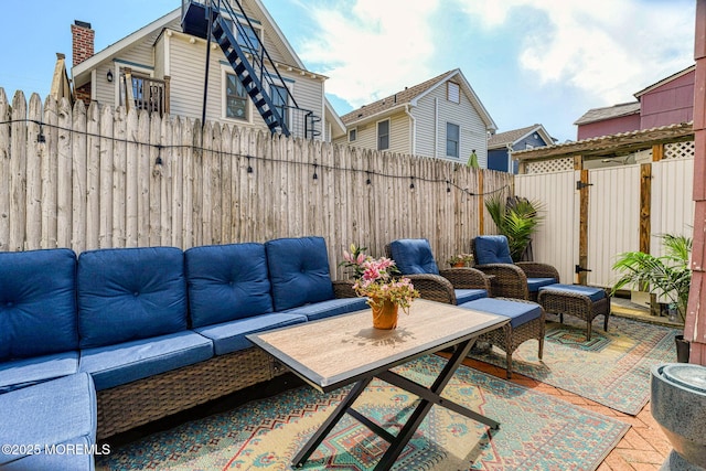 28 Olin St, Ocean Grove, NJ 07756 - fenced backyard with an outdoor hangout area and a patio