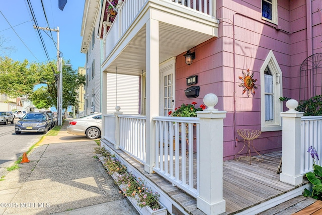 28 Olin St, Ocean Grove, NJ 07756 - property entrance with a porch