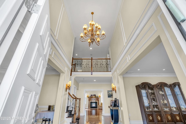 208 Imperial Ct, Lakewood, NJ 08701 - foyer with a high ceiling, stairs, a chandelier, recessed lighting, and crown molding