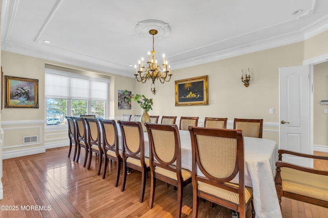 208 Imperial Ct, Lakewood, NJ 08701 - dining area featuring a chandelier, light wood finished floors, ornamental molding, recessed lighting, and a wainscoted wall