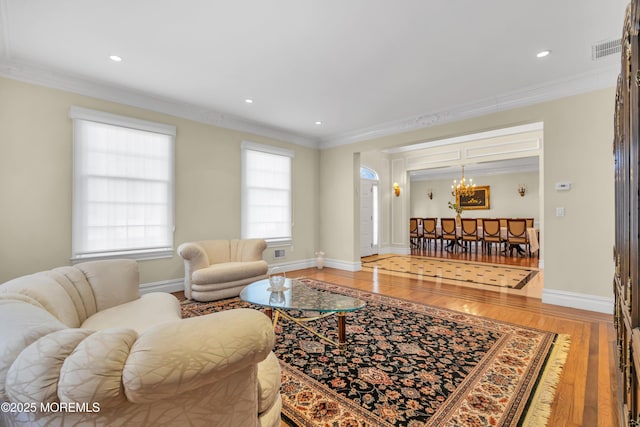 208 Imperial Ct, Lakewood, NJ 08701 - living room with a chandelier, ornamental molding, light wood-type flooring, and recessed lighting