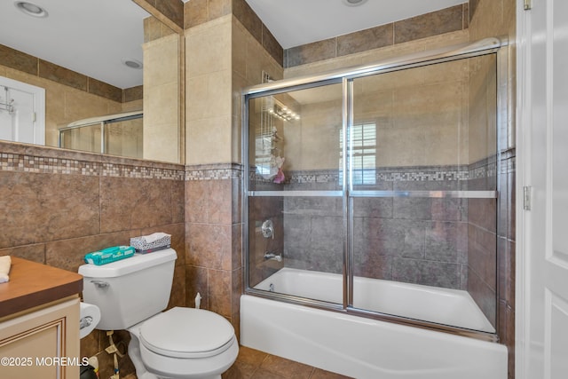 208 Imperial Ct, Lakewood, NJ 08701 - bathroom with tile walls, vanity, bath / shower combo with glass door, and tile patterned flooring