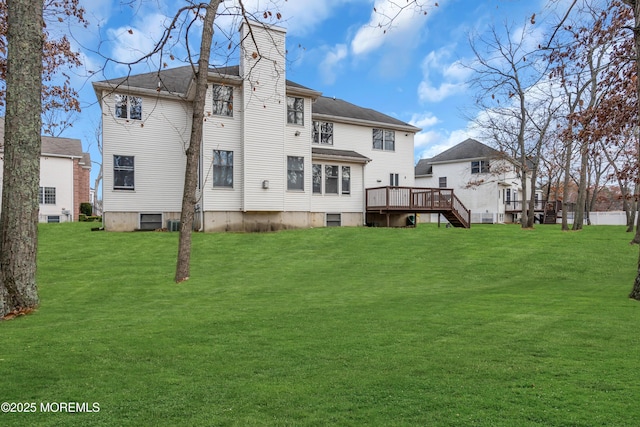 208 Imperial Ct, Lakewood, NJ 08701 - rear view of property featuring a lawn, a wooden deck, a chimney, and stairway