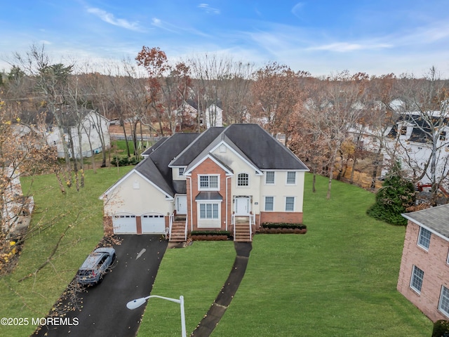 208 Imperial Ct, Lakewood, NJ 08701 - view of front of house with driveway, a front lawn, and a garage