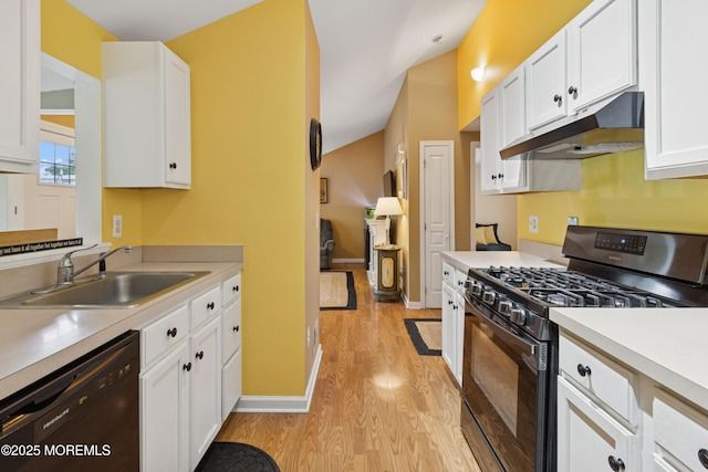 2015 Whitcomb Rd, Forked River, NJ 08731 - kitchen featuring black appliances, light wood-type flooring, under cabinet range hood, light countertops, and white cabinets