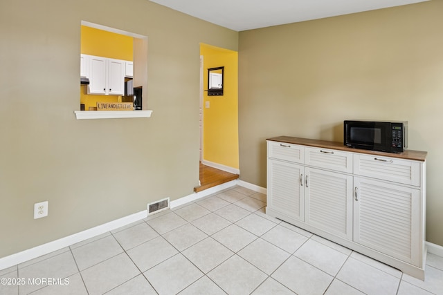 2015 Whitcomb Rd, Forked River, NJ 08731 - interior space with baseboards and light tile patterned floors