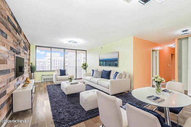 200 Winston Dr Unit 2921, Cliffside Park, NJ 07010 - living area with a stone fireplace and wood finished floors