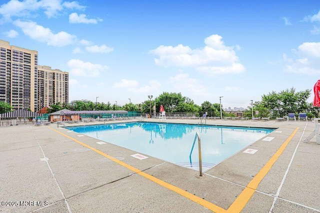200 Winston Dr Unit 2921, Cliffside Park, NJ 07010 - community pool with a patio