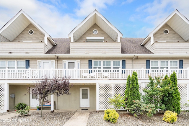 1301 SW Central Ave Unit A3, Seaside Park, NJ 08752 - view of front of home with a shingled roof and a wooden deck