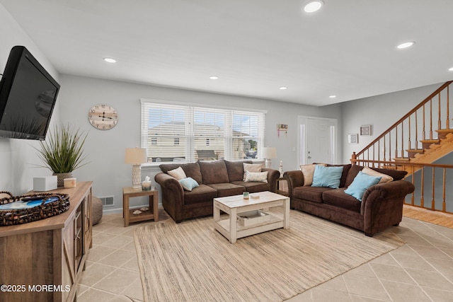 1301 SW Central Ave Unit A3, Seaside Park, NJ 08752 - living room with light tile patterned flooring, recessed lighting, and stairway