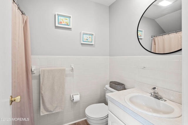1301 SW Central Ave Unit A3, Seaside Park, NJ 08752 - full bathroom featuring tile walls, vanity, a shower with shower curtain, and a wainscoted wall