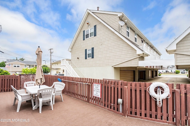 1301 SW Central Ave Unit A3, Seaside Park, NJ 08752 - rear view of house featuring outdoor dining space
