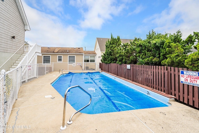 1301 SW Central Ave Unit A3, Seaside Park, NJ 08752 - community pool with a patio area and stairway