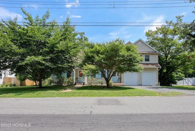 708 Lyman Ave, Brielle, NJ 08730 - view of property hidden behind natural elements featuring an attached garage and gravel driveway