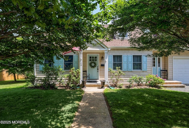708 Lyman Ave, Brielle, NJ 08730 - view of front facade featuring a front lawn and an attached garage