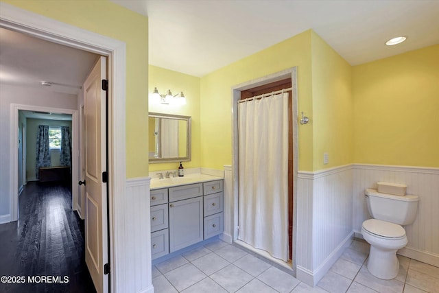 708 Lyman Ave, Brielle, NJ 08730 - bathroom featuring a wainscoted wall, vanity, and curtained shower