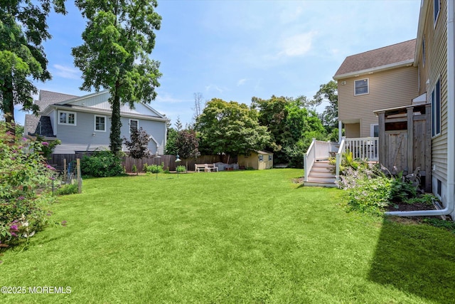 708 Lyman Ave, Brielle, NJ 08730 - view of yard featuring a deck and a storage unit