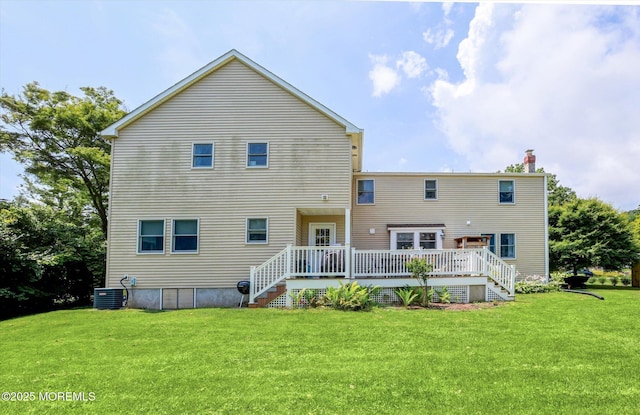 708 Lyman Ave, Brielle, NJ 08730 - back of property featuring a deck, a lawn, a chimney, and stairs