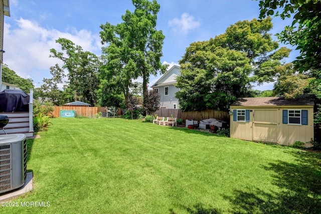 708 Lyman Ave, Brielle, NJ 08730 - fenced yard featuring a storage unit and outdoor lounge area