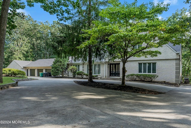 222 Bartley Rd, Jackson, NJ 08527 - ranch-style home with curved driveway and brick siding