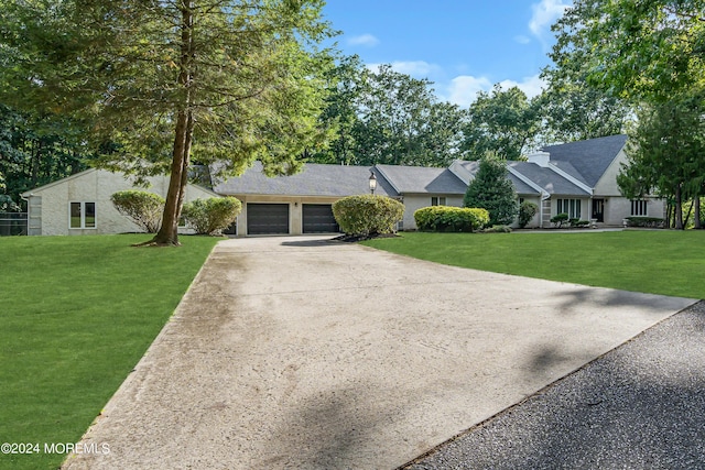 222 Bartley Rd, Jackson, NJ 08527 - ranch-style house featuring a garage, driveway, and a front yard