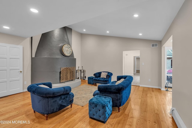 222 Bartley Rd, Jackson, NJ 08527 - sitting room with baseboard heating, light wood-style floors, recessed lighting, and vaulted ceiling