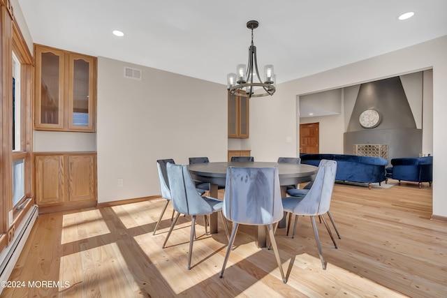 222 Bartley Rd, Jackson, NJ 08527 - dining area featuring a chandelier, a baseboard radiator, light wood finished floors, and recessed lighting