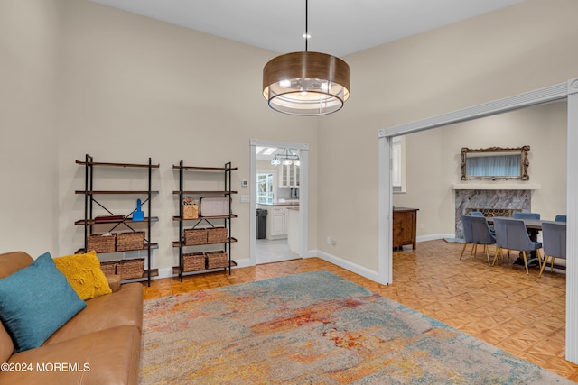 222 Bartley Rd, Jackson, NJ 08527 - living room with baseboards and a chandelier