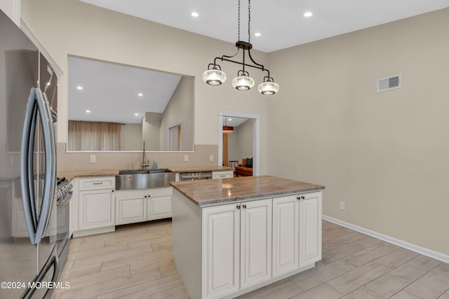 222 Bartley Rd, Jackson, NJ 08527 - kitchen featuring appliances with stainless steel finishes, tasteful backsplash, white cabinets, light stone counters, and recessed lighting