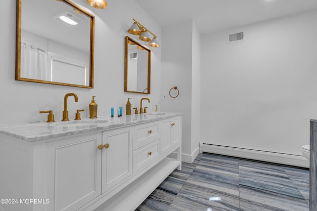 222 Bartley Rd, Jackson, NJ 08527 - full bathroom with baseboard heating and double vanity