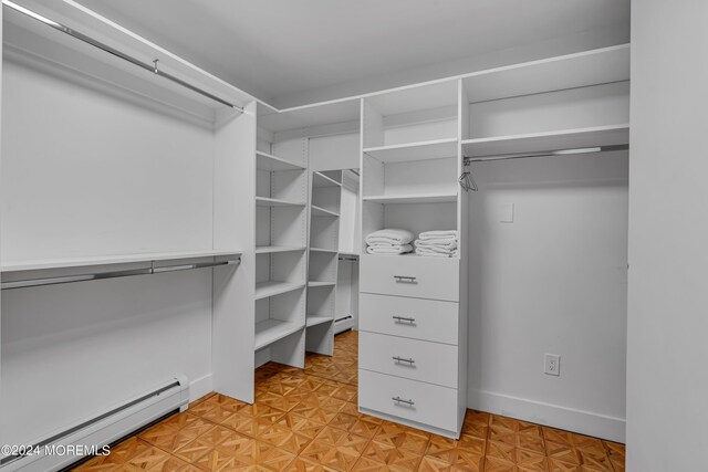 222 Bartley Rd, Jackson, NJ 08527 - walk in closet with a baseboard heating unit